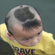 Illustration for article titled The Little Boy with an Apple Haircut
